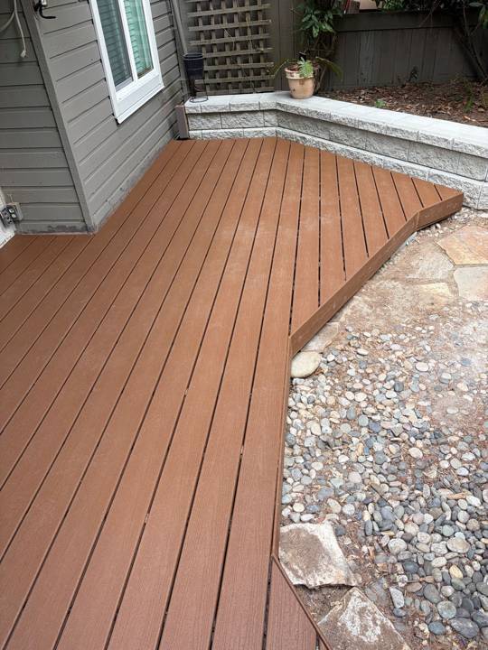 Deck around stonework