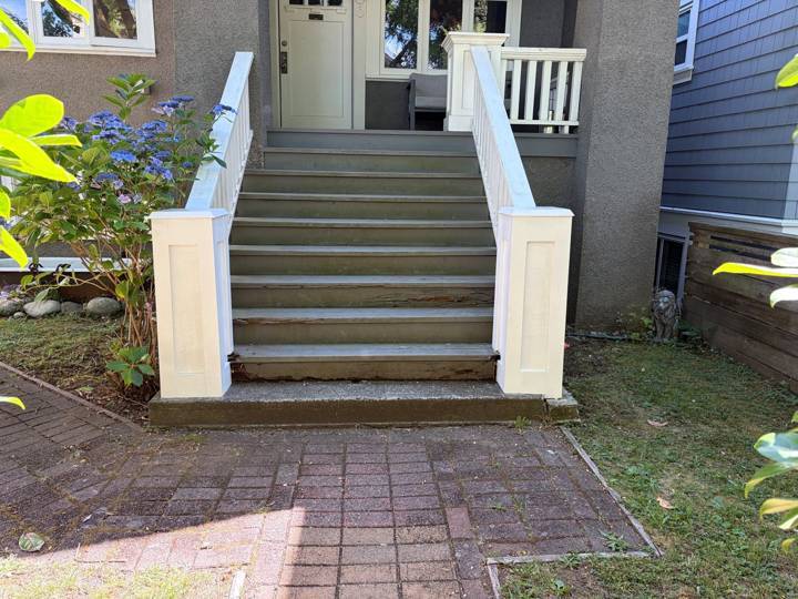 Porch posts rebuilt, after