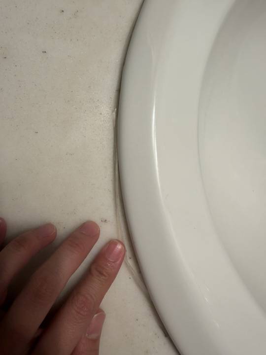 Vanity sink reseal, before